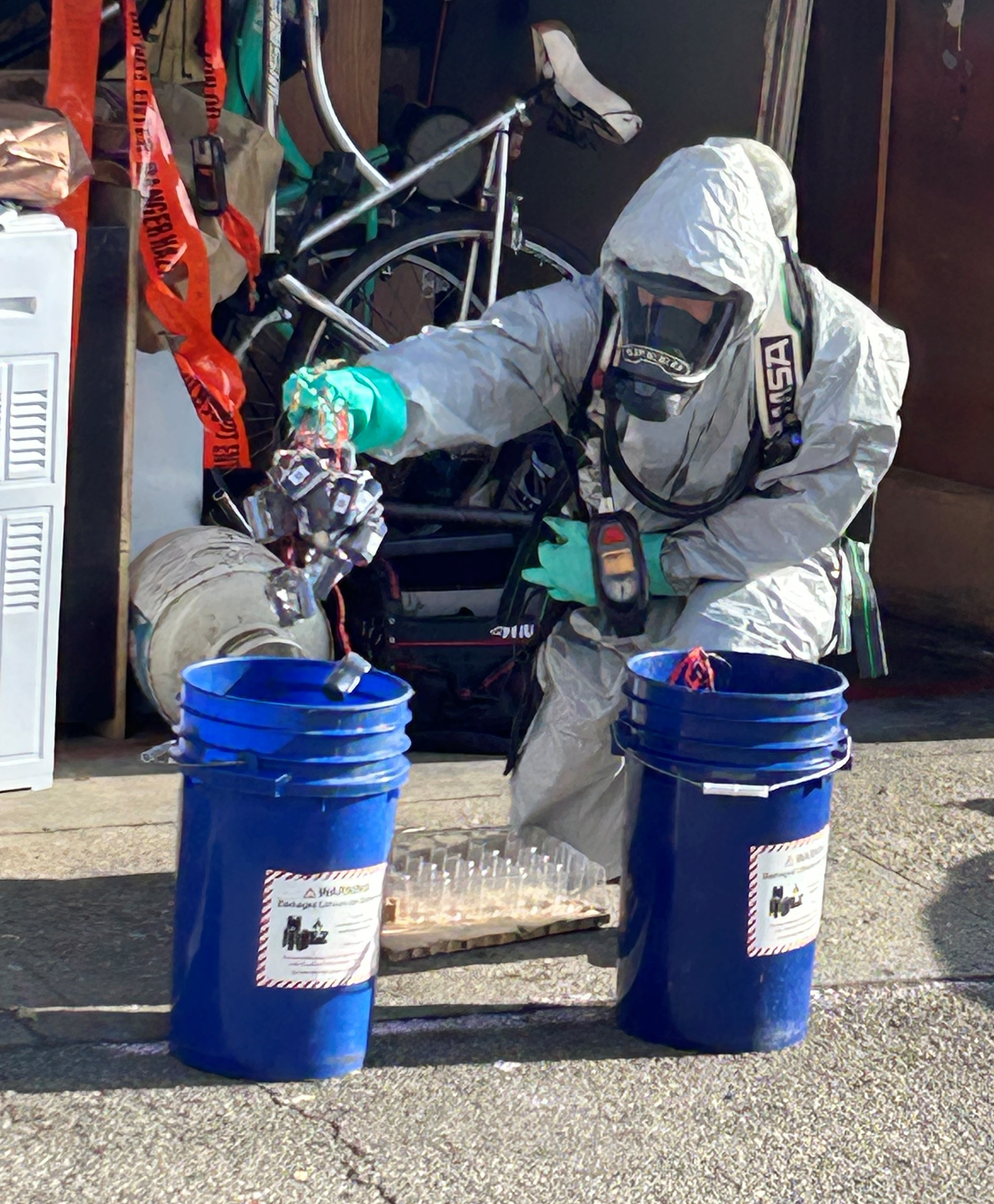 Hazmat team member handling hazardous materials