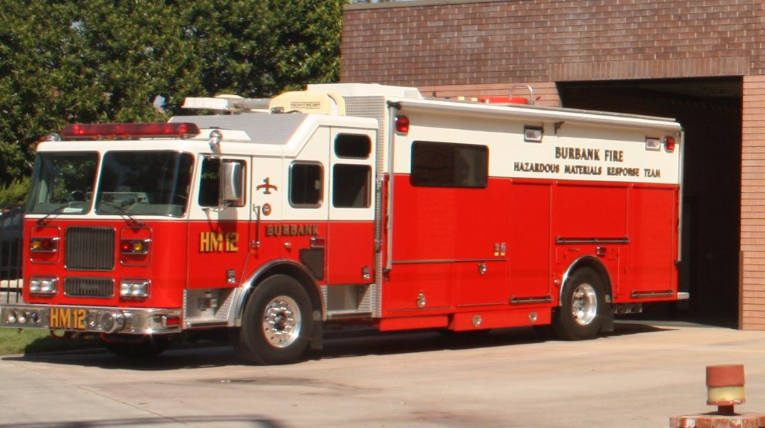 Hazardous Materials Response Team Truck in front of fire station