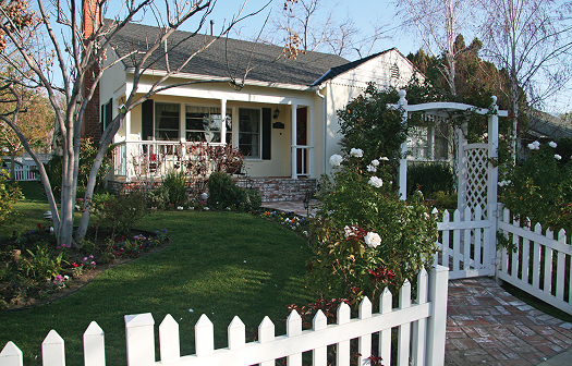 home in Burbank with white picket fence