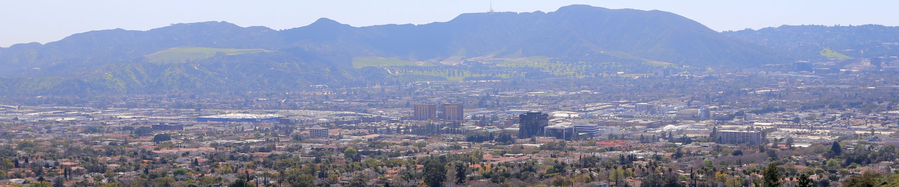 Burbank firefighters in the hills above Burbank on a hazy day