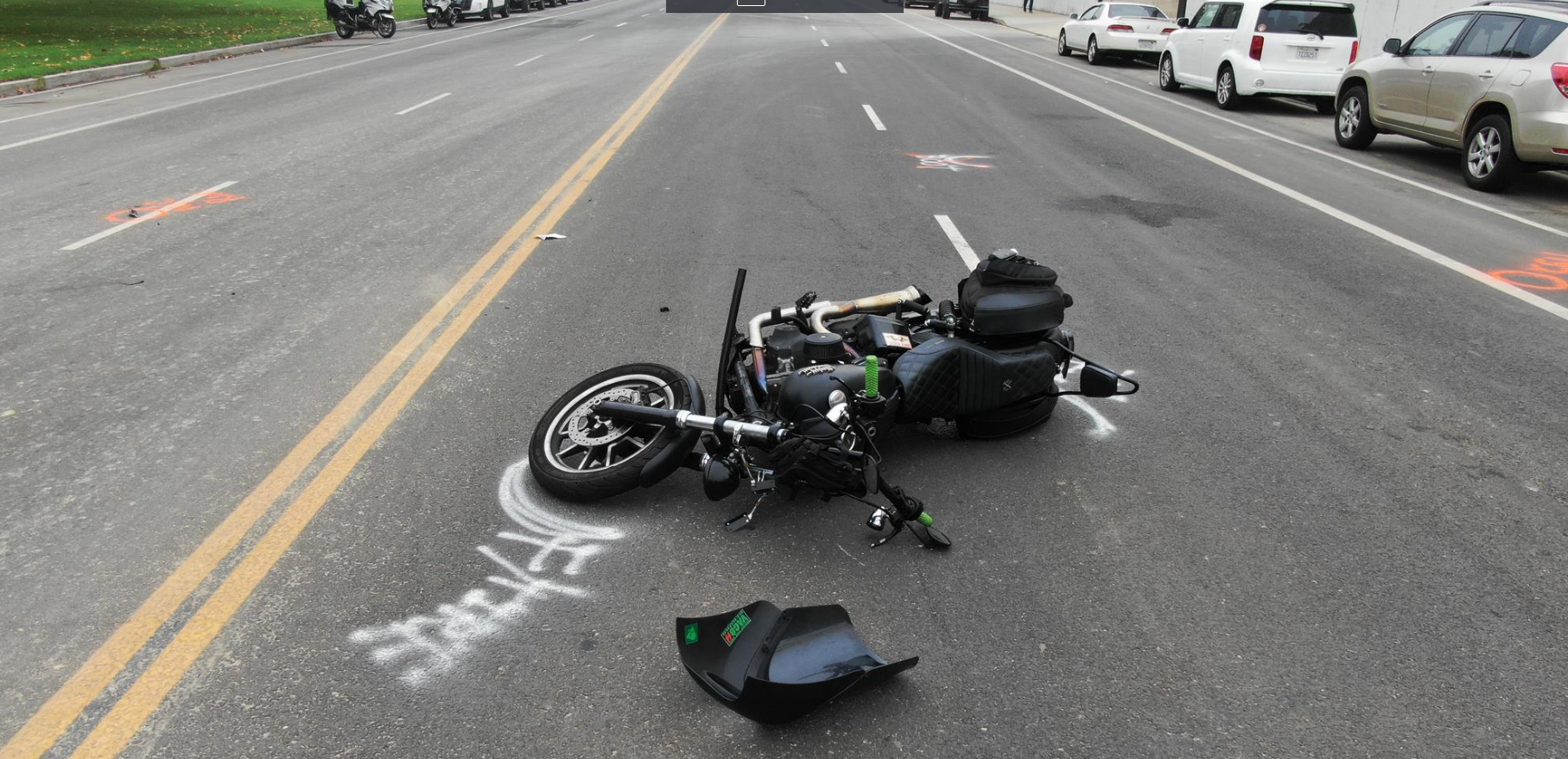 traffic accident with motorcycle tipped over