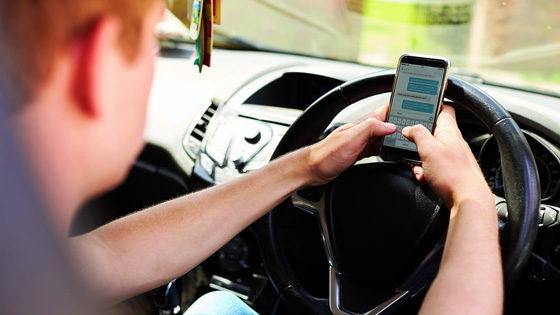 distracted driver with cell phone