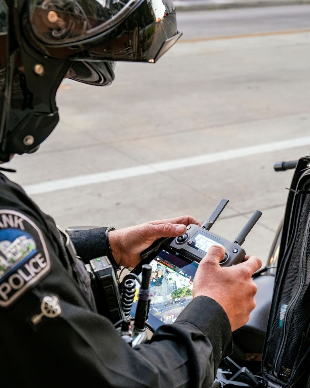 Police officer with drone remote control