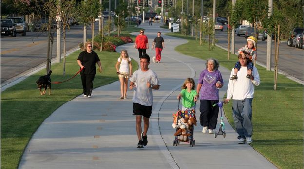 Pedestrians walking and jogging