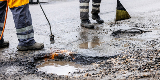 Public Works crews fixing potholes